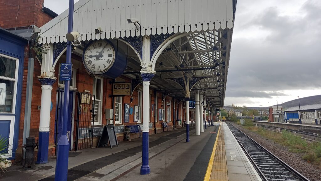 The Platform Canopy at Stalybridge, including a vintage clock.