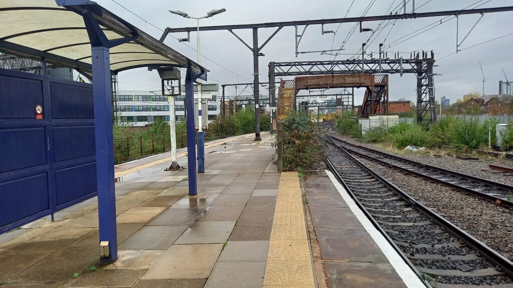 Looking down the platform at Ardwick towards the footbridge.